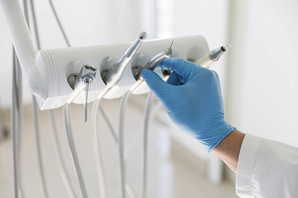 Professional Emergency Dentist technician working in Dunellen, NJ